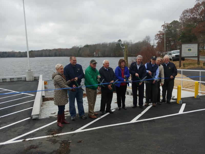 Cutting the ribbon at DNREC’s renovated boat ramp in Millsboro are (l-r) Rep. Ruth Briggs King, R-Georgetown; DNREC Division of Fish and Wildlife Project Manager Jeremy Ashe; Rep. Richard Collins, R-Millsboro; Sen. Gerald Hocker, R-Ocean View; Millsboro Mayor Michelle Truitt; DNREC Secretary Shawn M. Garvin; U.S. Senator Tom Carper; DNREC Division of Fish and Wildlife Director David Saveikis; and Sen. David Wilson R-Bridgeville. SUBMITTED PHOTOS